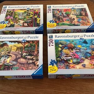 (4) Ravensburger 750 piece puzzles
